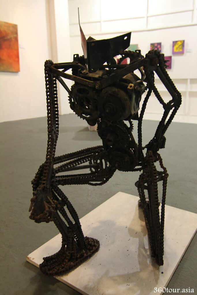 The Metal Sculpture depict a Humanoid robot. The material is mainly from scrap metals of motorcycles.