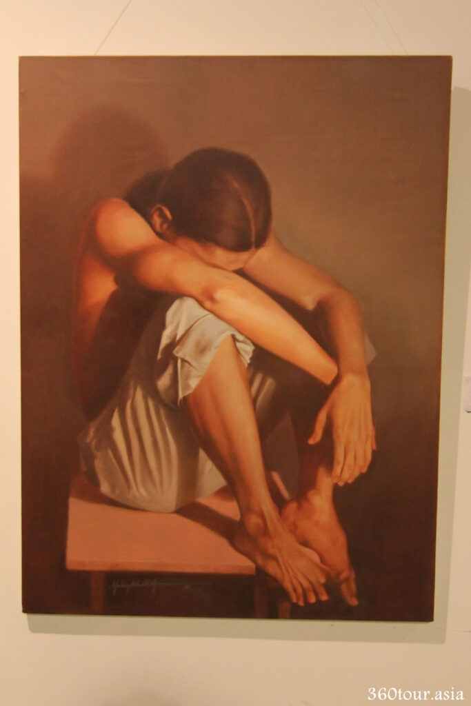 The Painting depicts a women in depression. Notice how the artist portray the emotion of sadness via painting itself.