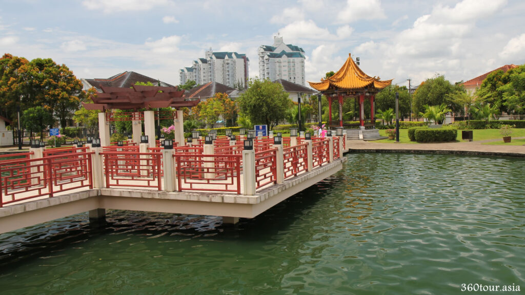 Huai Feng Pavilion as seen over ZigZag bridge over the Lily Pond