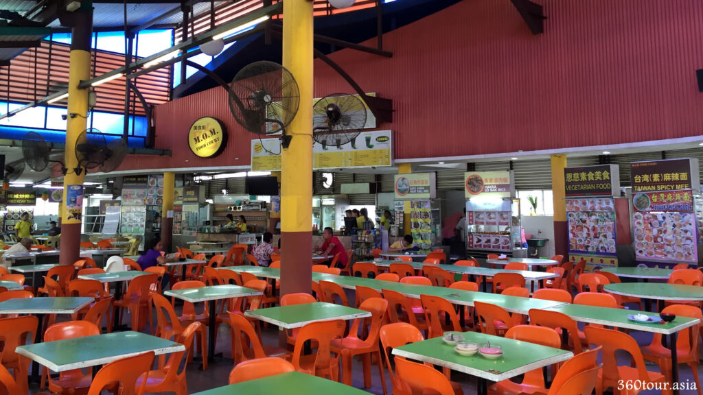 Inside M.O.M. Food Court: Spacious indoor dining hall with varieties of Hawker stalls