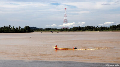 From afar, the Tidal bore appears as a thin line of white waves.