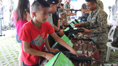 Hands on on the military weapons.