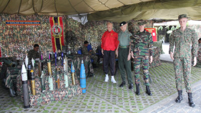 Another section showing various uniforms and weapons.