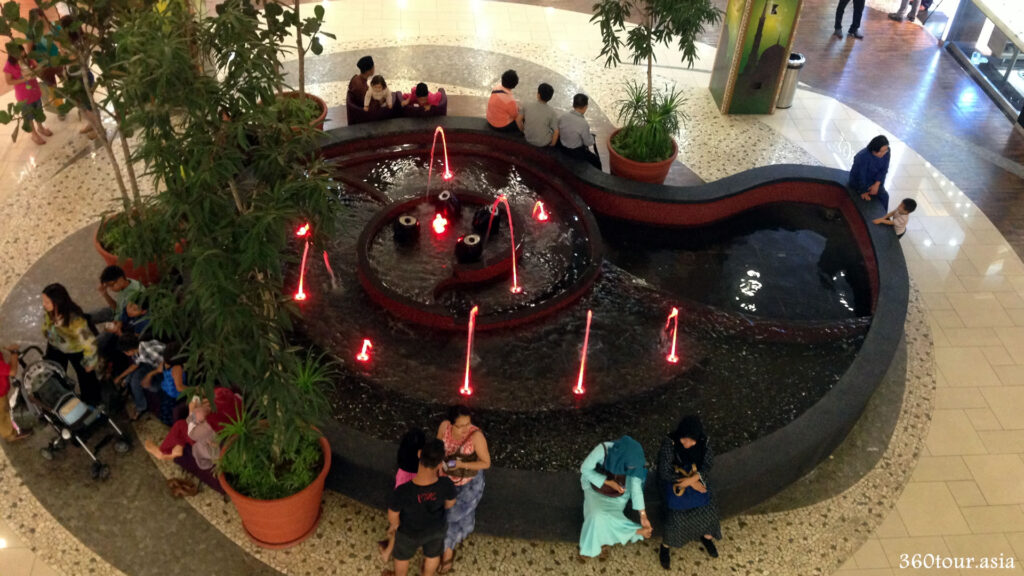 The Sea-shell shaped water feature and fountain as view from the top floor of the mall.