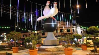 A closer view of the Twin Dove Statue at the Twin Dove Roundabout. Notice the newly laid pavement and potted plants.