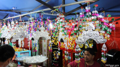 The stall selling traditional costumes and head ornaments.
