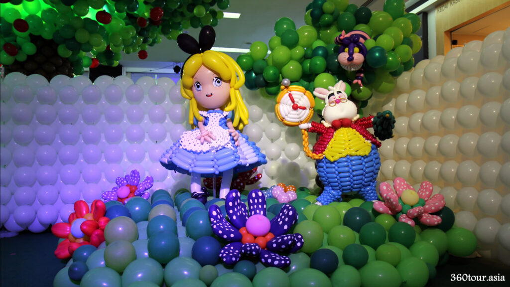Alice in wonderland balloon sculpture featuring Alice and the White Rabbit