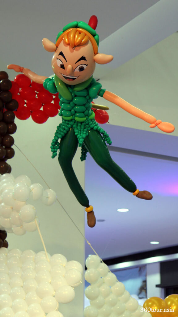 Peter Pan Balloon Sculpture as fly hanging from the ceiling