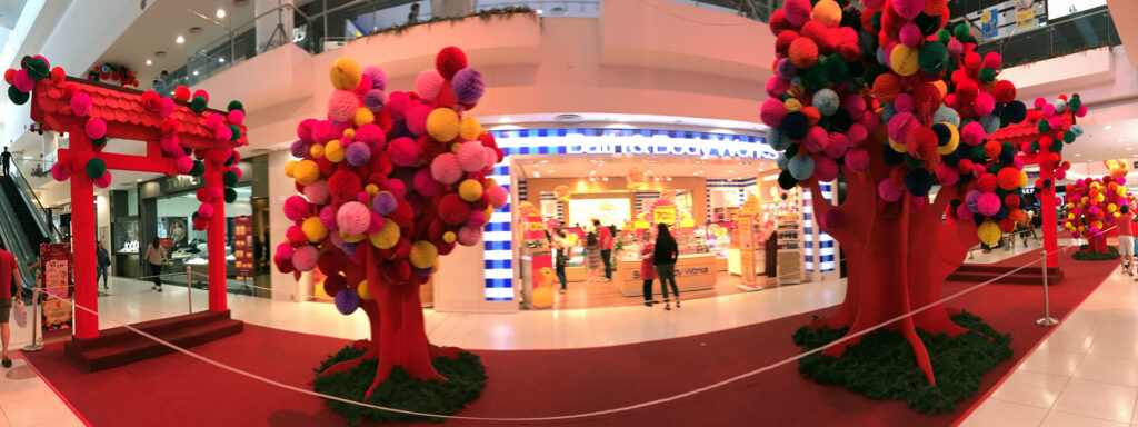 The panorama view of the lantern tree row at west court of The Spring Mall