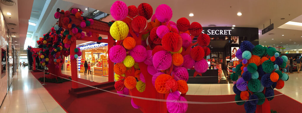 The panorama view of the lantern tree row at west court of The Spring Mall