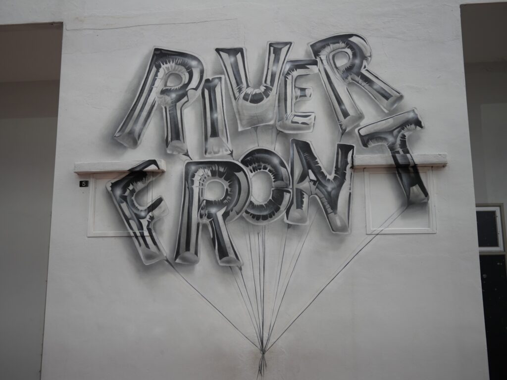 silver balloons with wording RIVERFRONT 