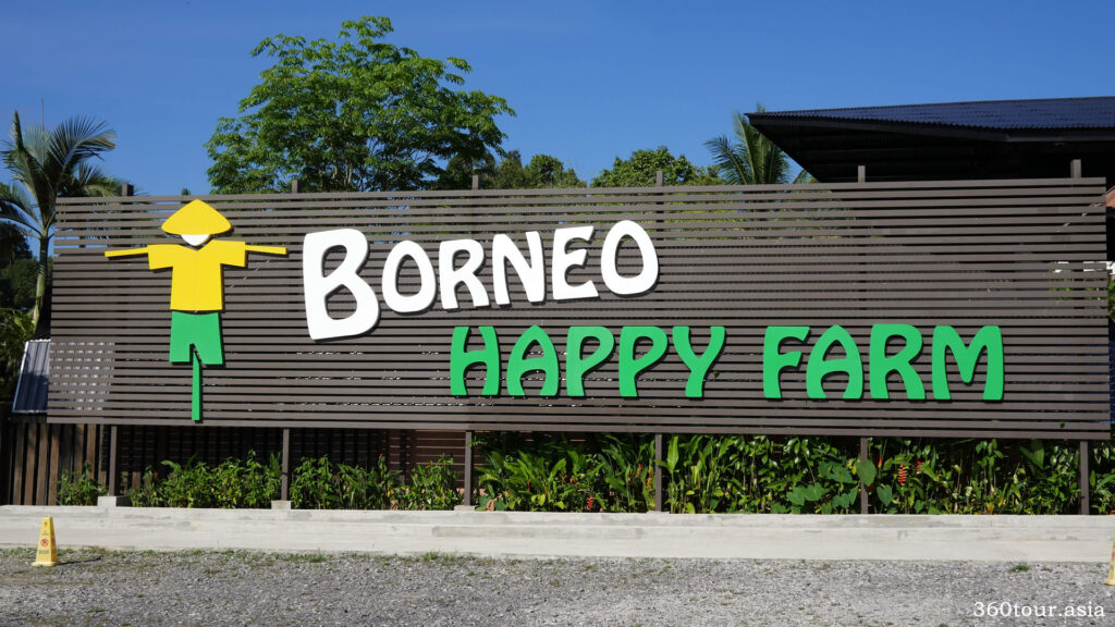 The huge Borneo Happy Farm welcome signage