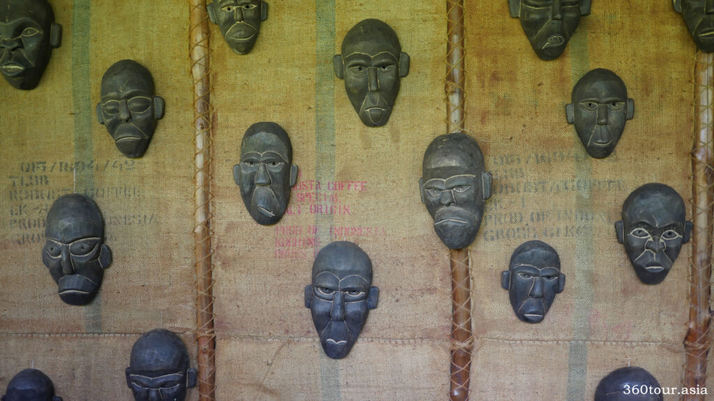 Wall of wooden masks