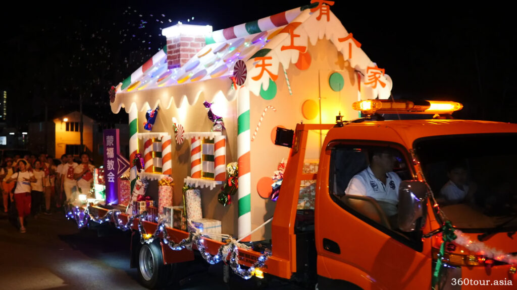 The Christmas floats featuring candy house