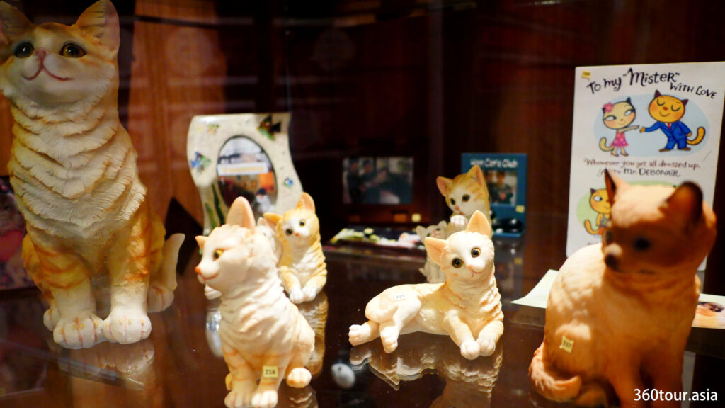 Cute Ceramic Cats on display.