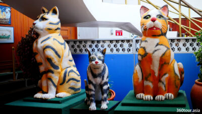 Huge cat statues.