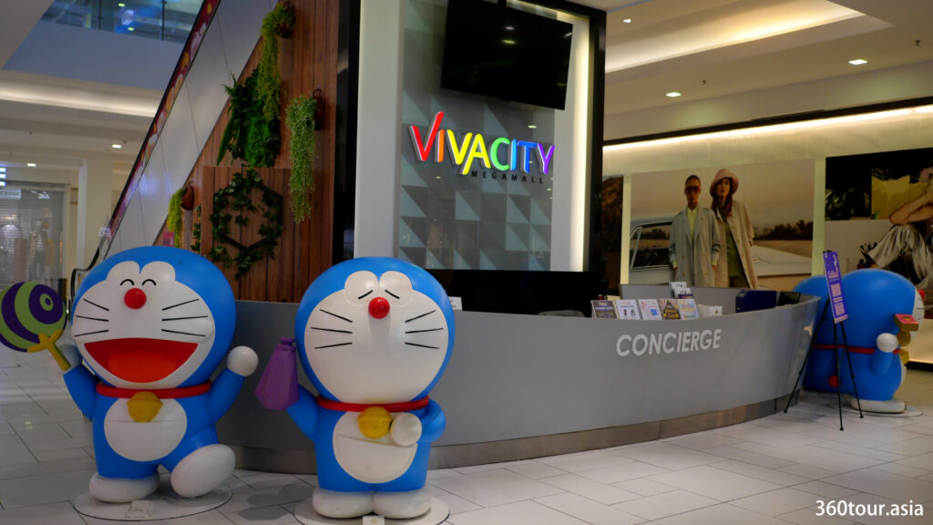 The Doraemon statue beside the information counter.