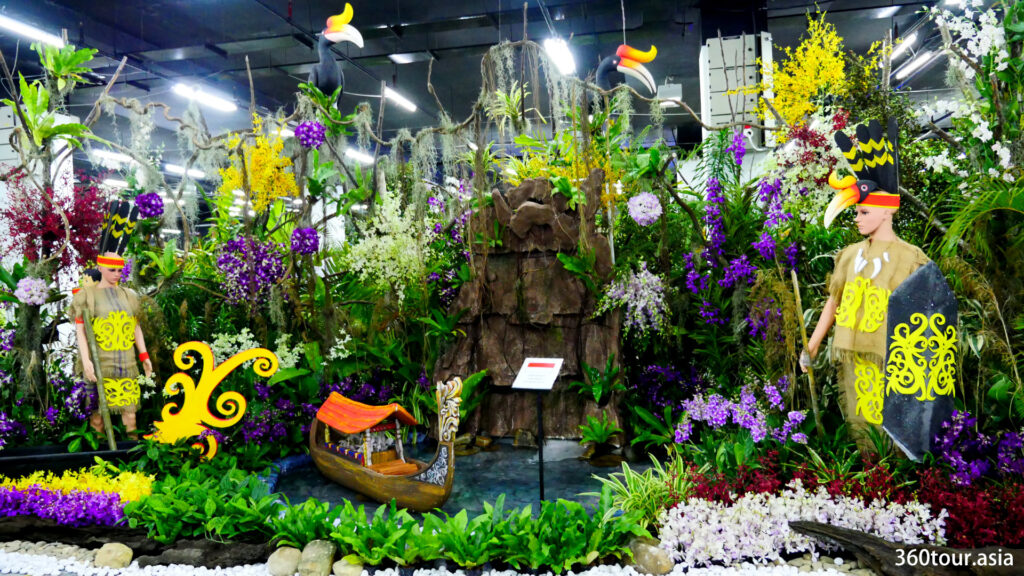 The Orchid Landscape by the Indonesia Orchids Community, featuring the tropical rainforest of orchids and hornbills. 