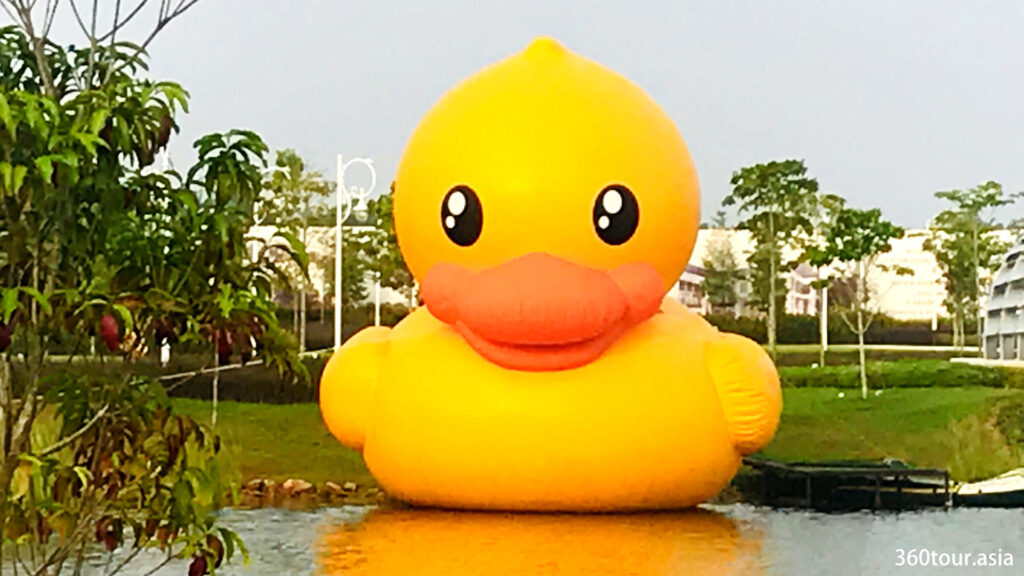 The huge floating yellow duck on the lake.