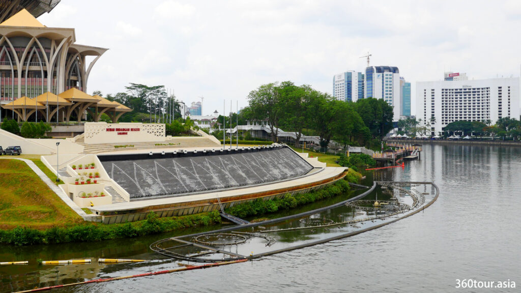 The Darul Hana Musical Fountain and the background of Kuching City.