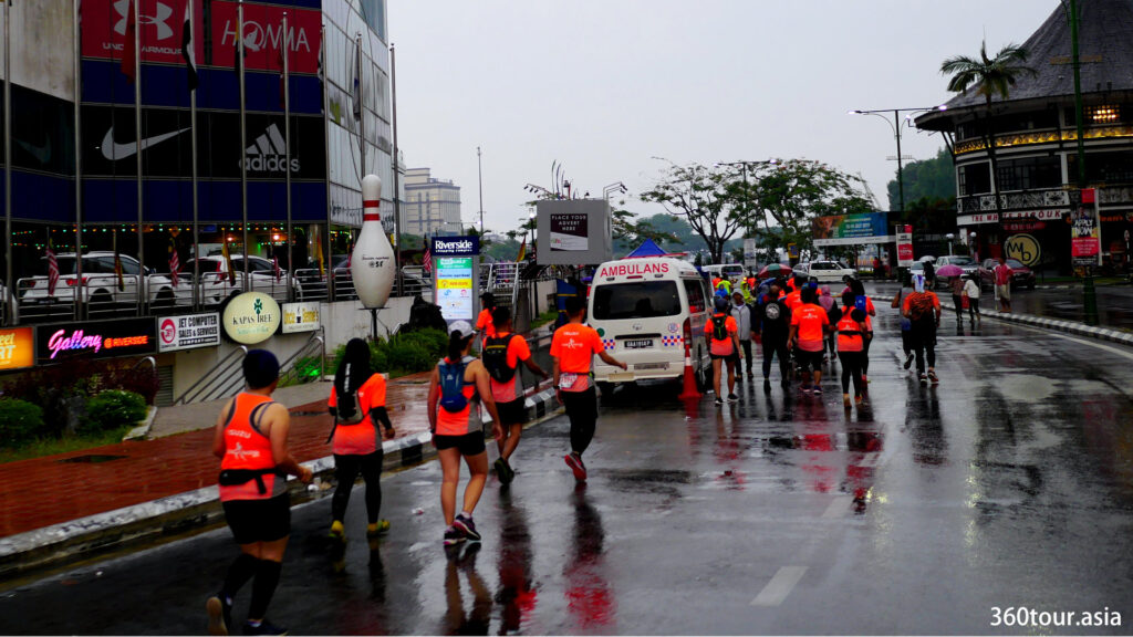 Marathon runners passing the Kuching Waterfront.