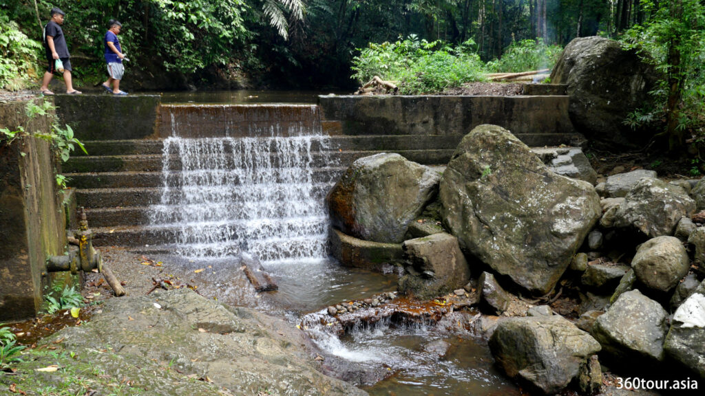 The small dam and water cascade. 