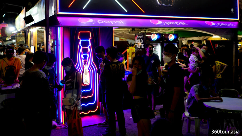 Creative neon lights decorating the booth.