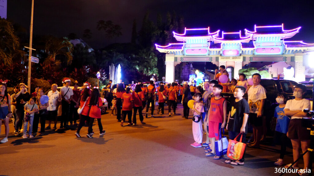 Marching towards the beautiful light up gateway of Kuching city.