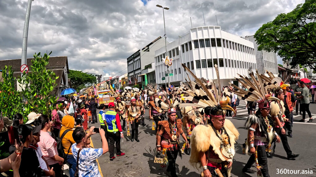 The Gawai Dayak Cultural Parade 2024 proceed along the Kuching Waterfront.